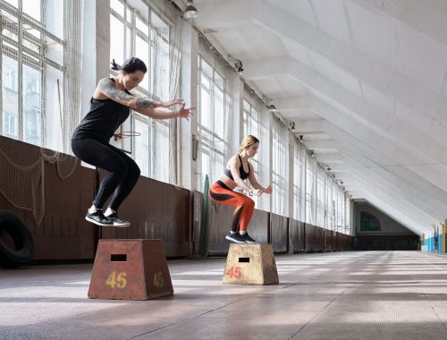 Girls having full-body training